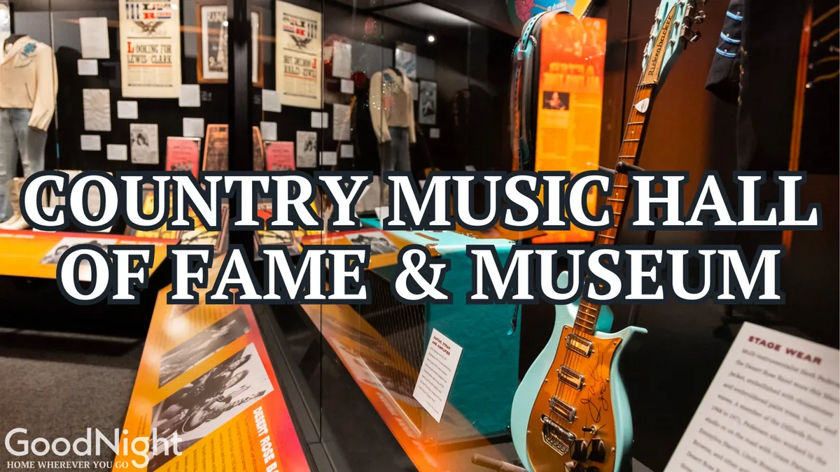 This image offers a look inside the Country Music Hall of Fame, featuring a guitar, stage wear, and historical memorabilia. It immerses viewers in the rich history of Nashville's music scene, reflecting the city's iconic status as 'Music City.'